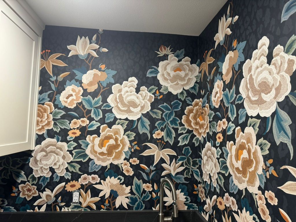 Traditional patterned wallpaper install wrapping an interior corner