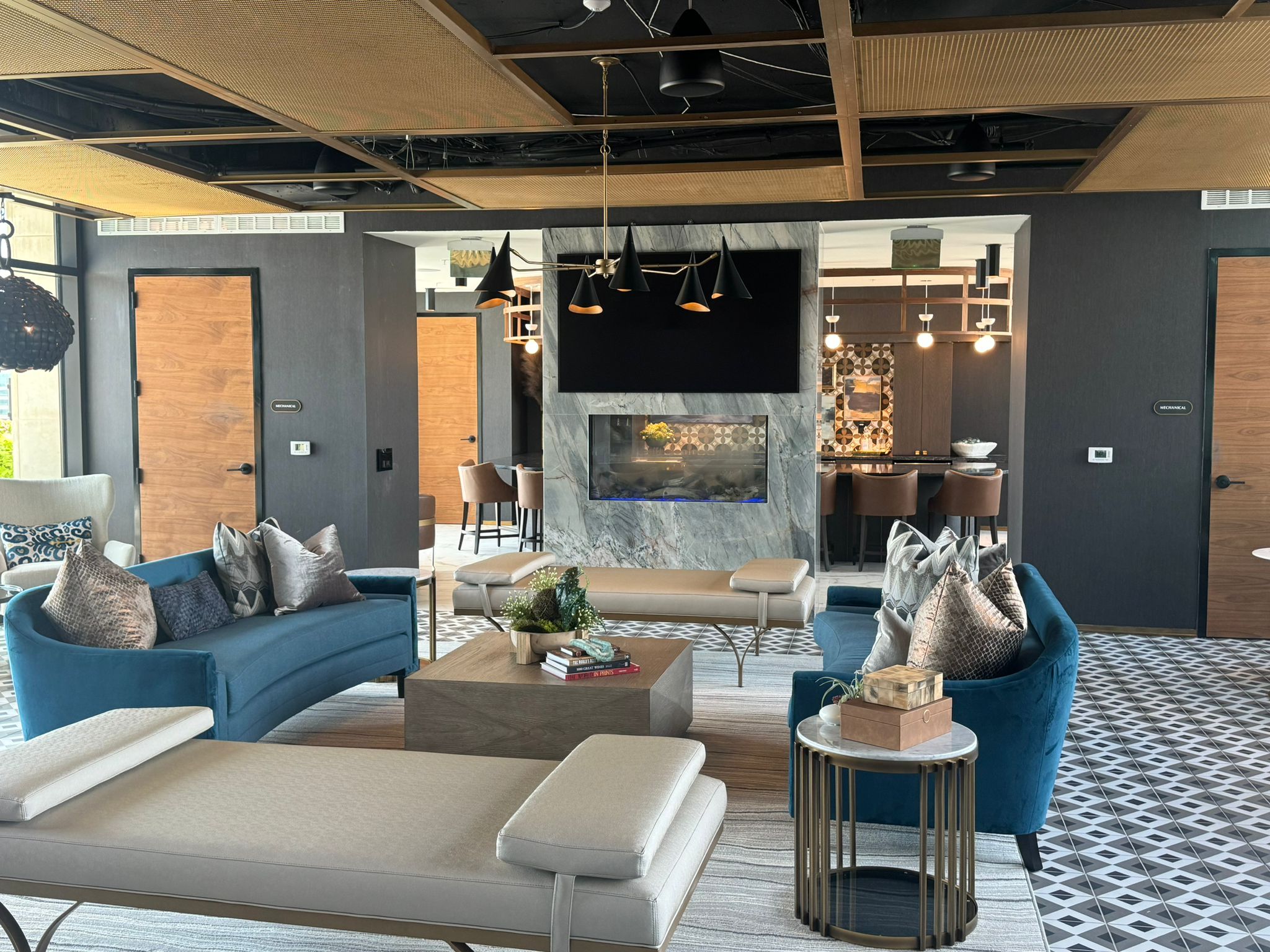 Modern commercial lounge with textured dark wallcovering